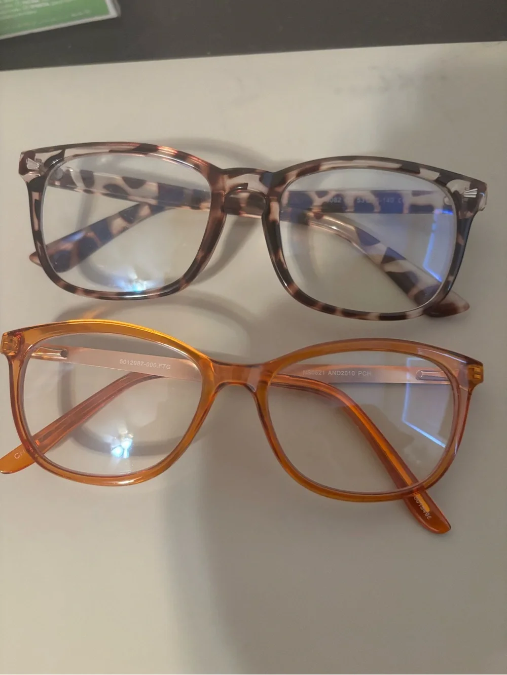 Two pack blue light glasses headache prevention great condition tortoise and miu